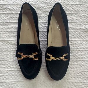 Suede “flat form” loafers with gold detail